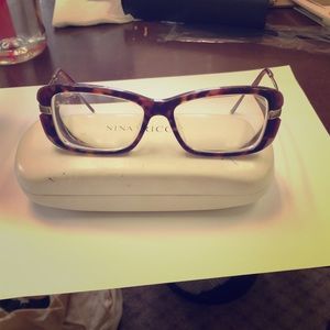 Nina Ricci frame / case . Mint condition.